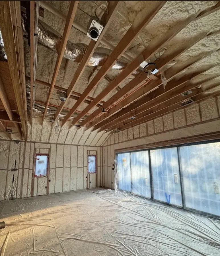 Interior walls and ceiling insulated with spray foam during new construction in Spencer